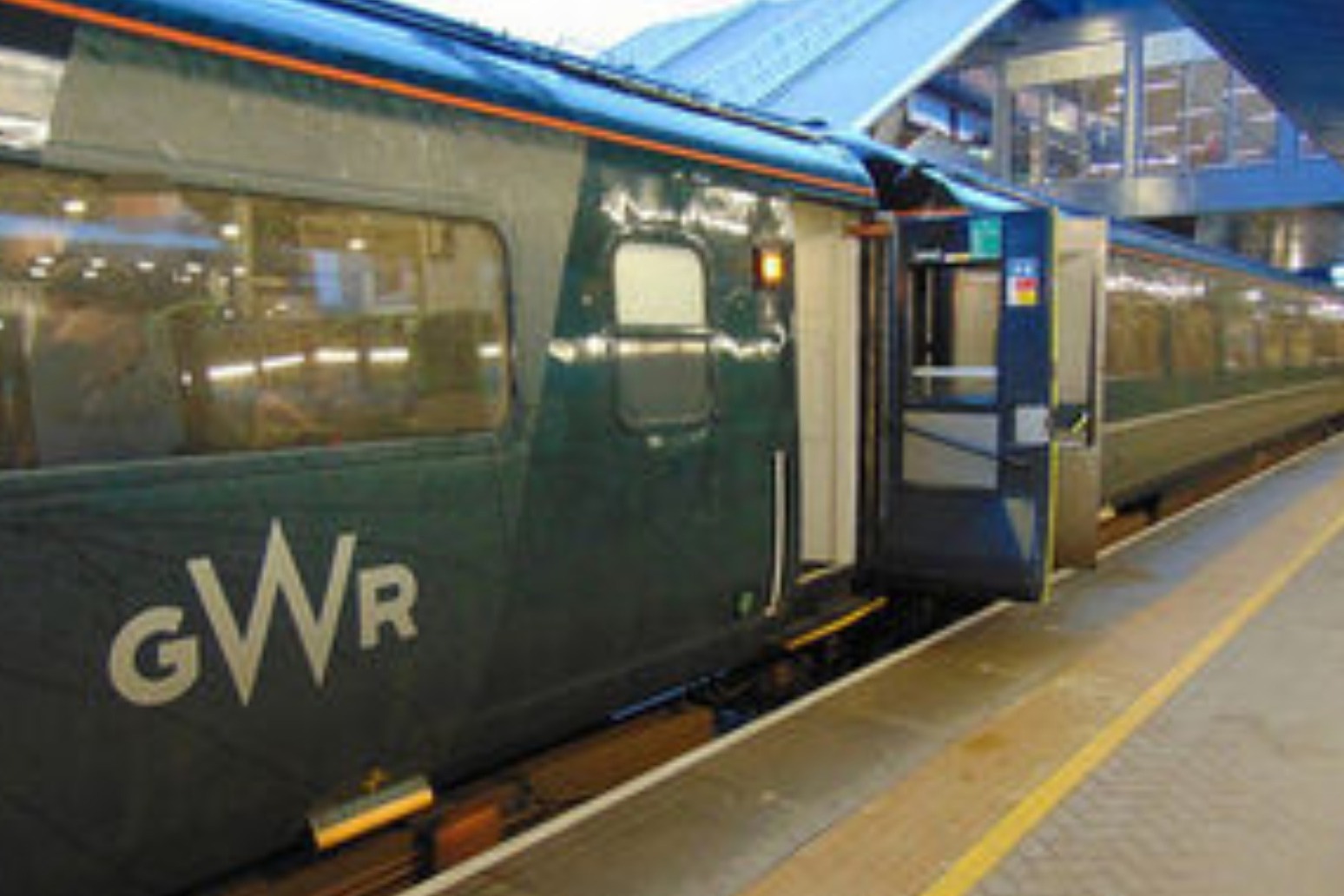 WOMAN DIED LEANING FROM TRAIN WINDOW BELOW INADEQUATE WARNING SIGN - REPORT 
